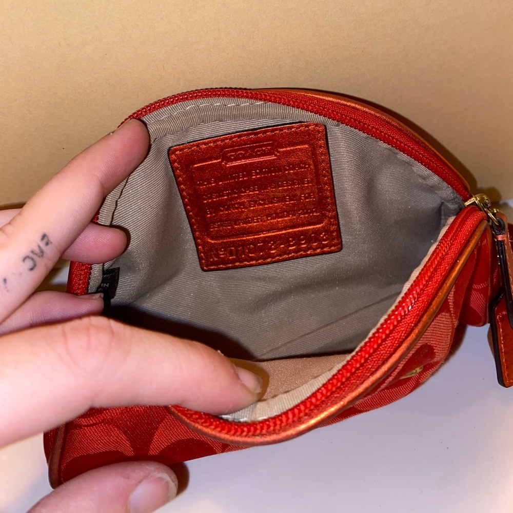 In good condition. Coach cosmetic bag.